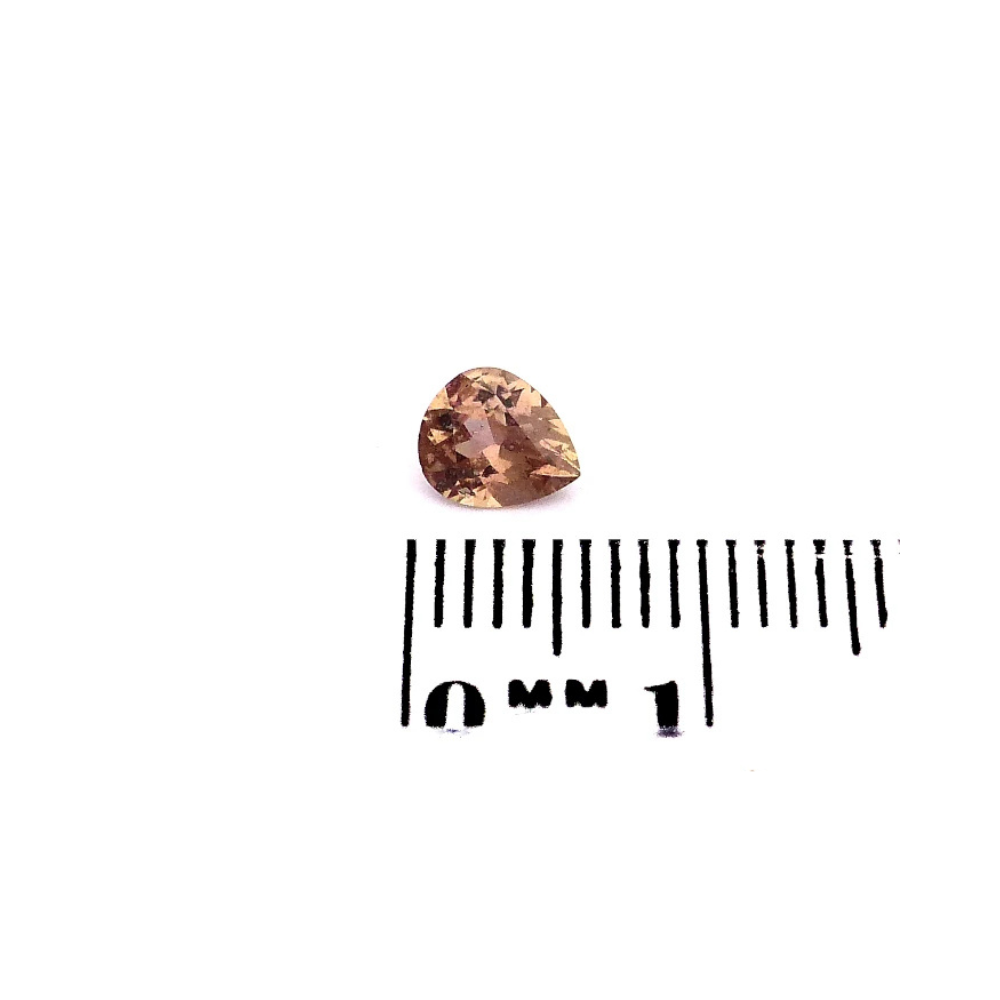 Saphir 0.59 ct orange birne kaufen (1) Saphir 0.59 Karat padparadscha birne kaufen – unbehandelt & leuchtend pfirsichrosa aus Madagaskar