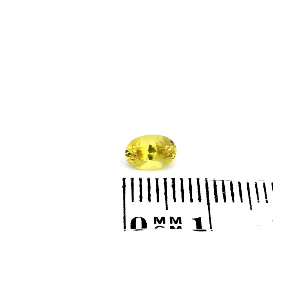 Saphir 0.72 ct Gelb Oval kaufen – Unbehandelter Edelstein aus Madagaskar (3) Saphir 0.72 Karat Gelb Oval kaufen – Unbehandelter Edelstein aus Madagaskar