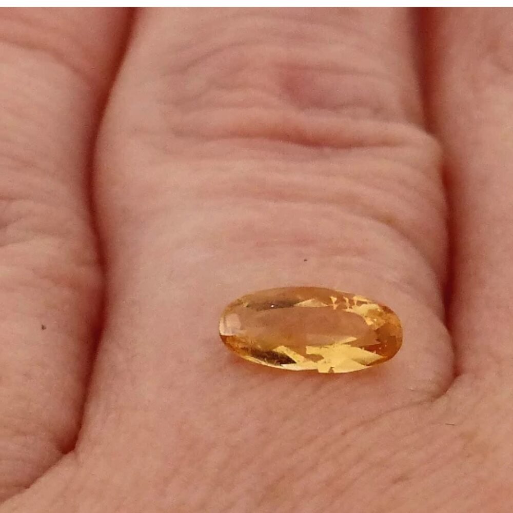 Topas Imperial 0.81 Karat Orange-Gelb Oval (2) Topas Imperial 0.81 Karat Orange-Gelb Oval