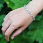 zilveren-armband-rozenkwarts-ovaal-facet-8-x-6-mm (2) Armband mit Rosenquarz Oval Facettiert – Handgefertigt aus 925 Silber